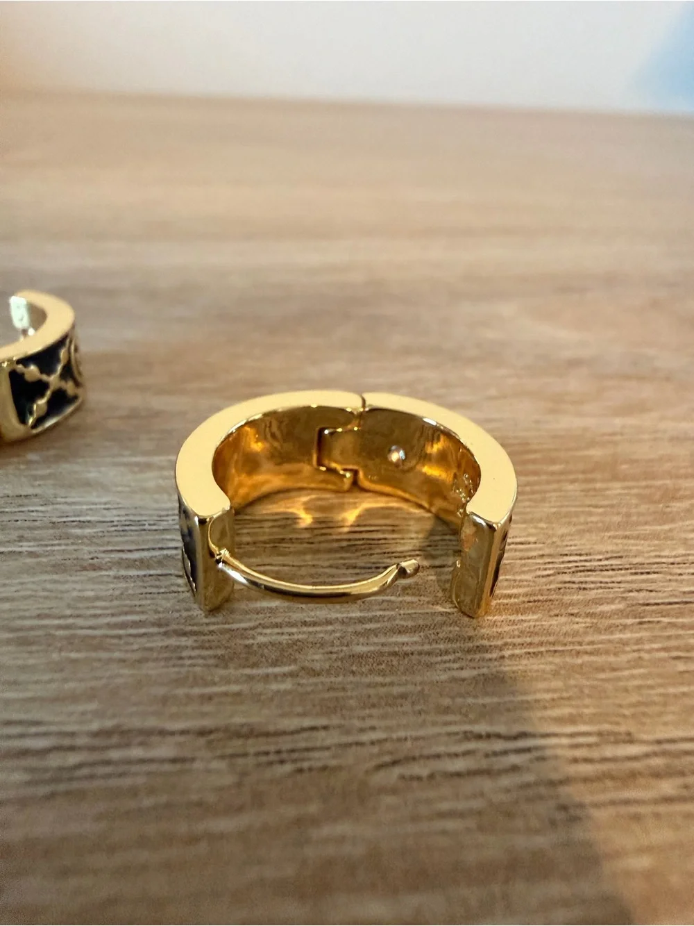 Tory Burch Kira Black Enamel Logo Huggie Hoop Earrings Gold Tone
